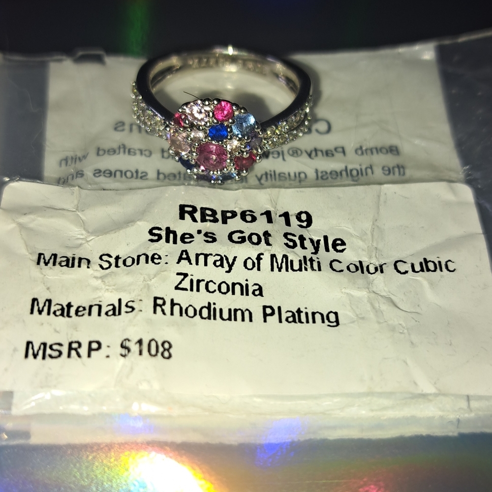 Array of Multi Color Cubic Zirconia on Rhodium Plating.  Size 6